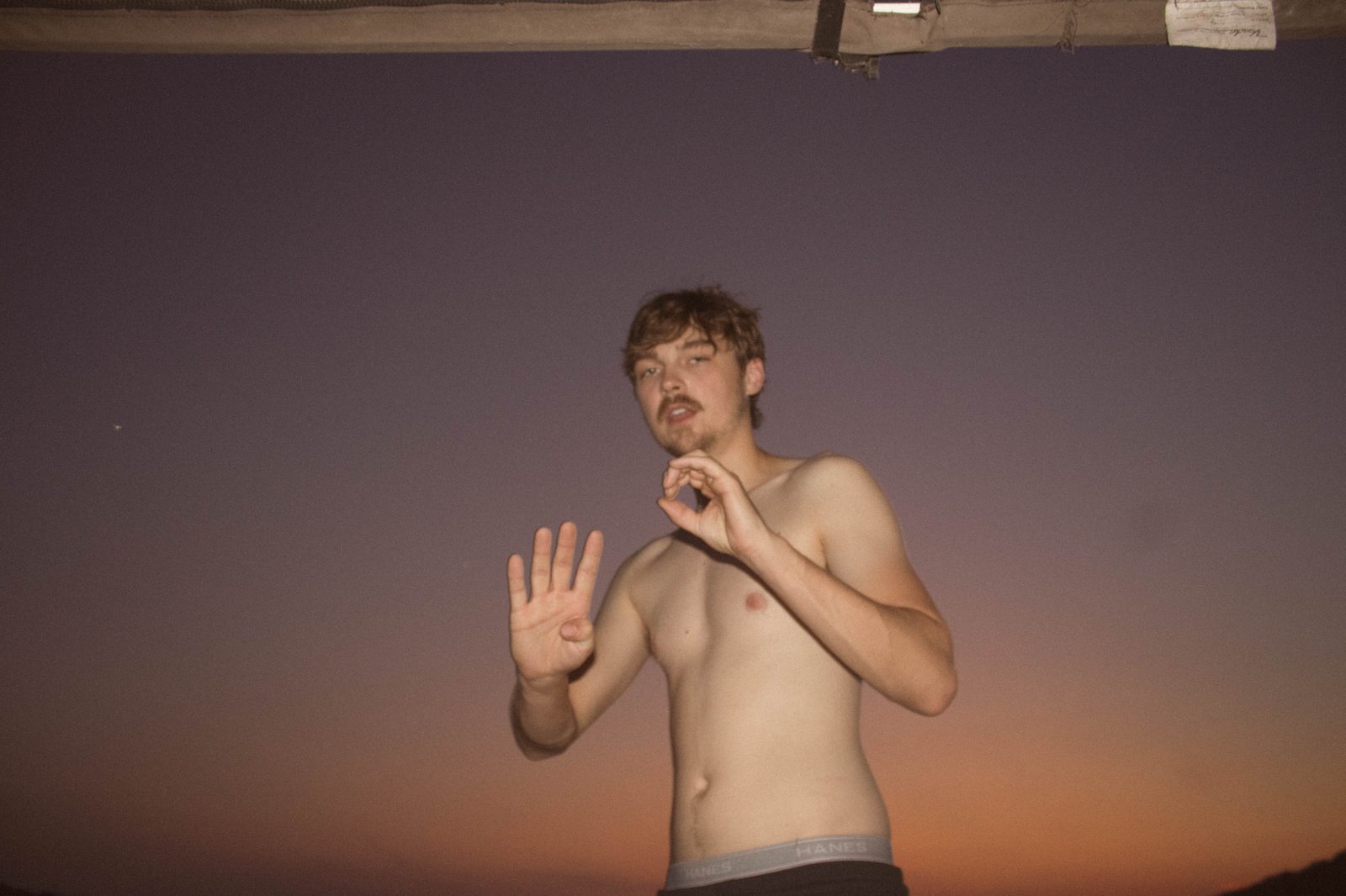 04Riley posing against the dusk sky